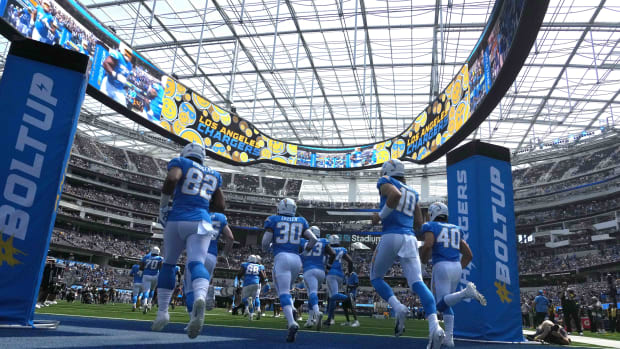 Sep 25, 2022; Inglewood, California, USA; A general overall view as Los Angeles Chargers tight end Richard Rodgers (82), quarterback Justin Herbert (10), fullback Zander Horvath (40) and running back Austin Ekeler (30) head onto the field before the game against the Jacksonville Jaguars SoFi Stadium. Mandatory Credit: Kirby Lee-USA TODAY Sports